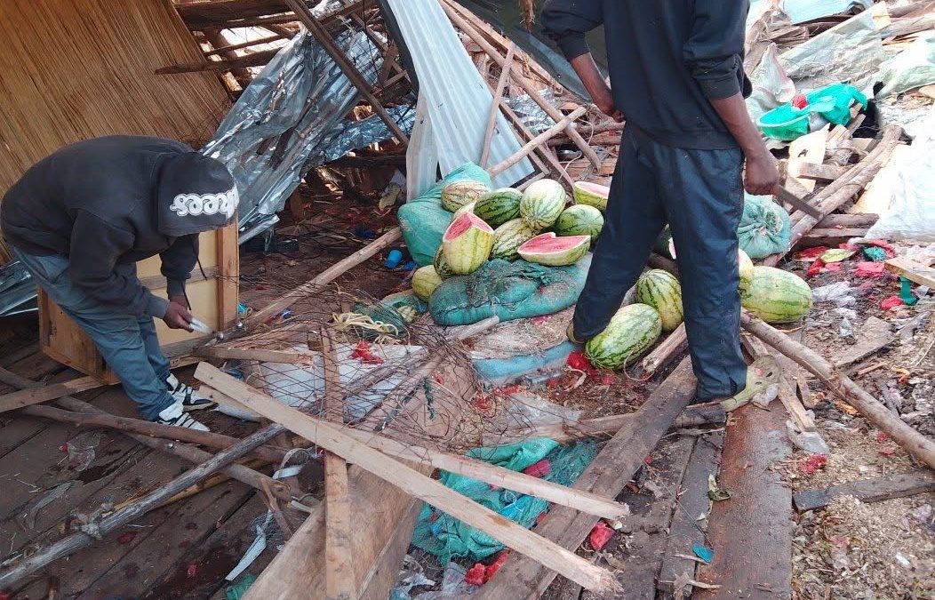 Traders stare at damnaged watermelons after structures demolished. PHOTO/@rigathi/X