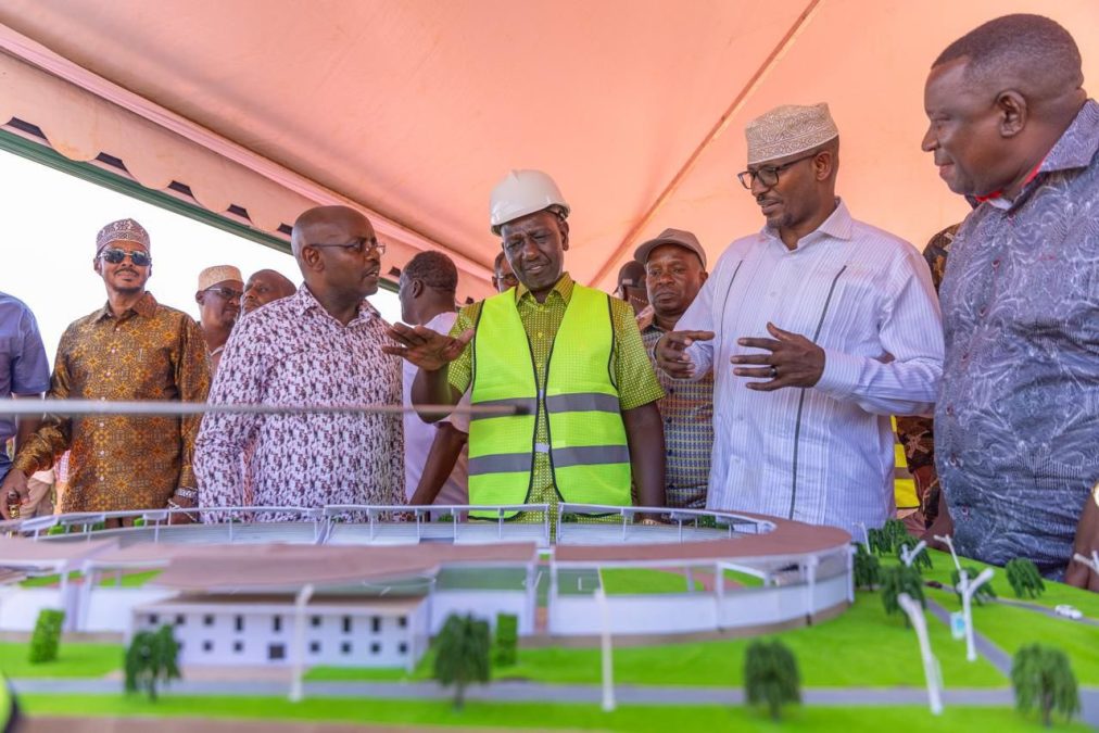 President William Ruto, accompanied by other leaders, inspects a scale model of the proposed Wajir Stadium. PHOTO/@Waziri_Mvurya/X