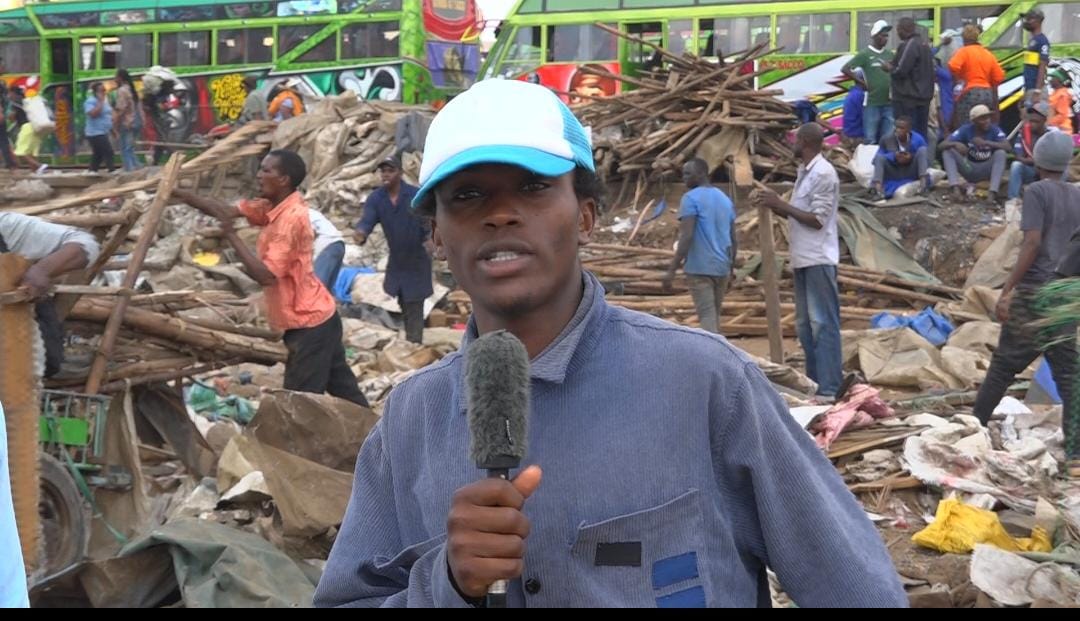 Kimani Wa Nduta with the microphone at Githurai market in Ruiru, Kiambu County. PHOTO/Mathew Ndung'u
