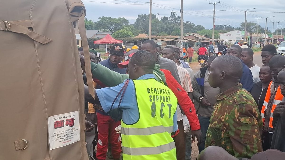 Members of the public viewing the body of a boda-boda rider hit to death next to Bama hosiptal at around 5: 30 pm PHOTO/By Eric Juma