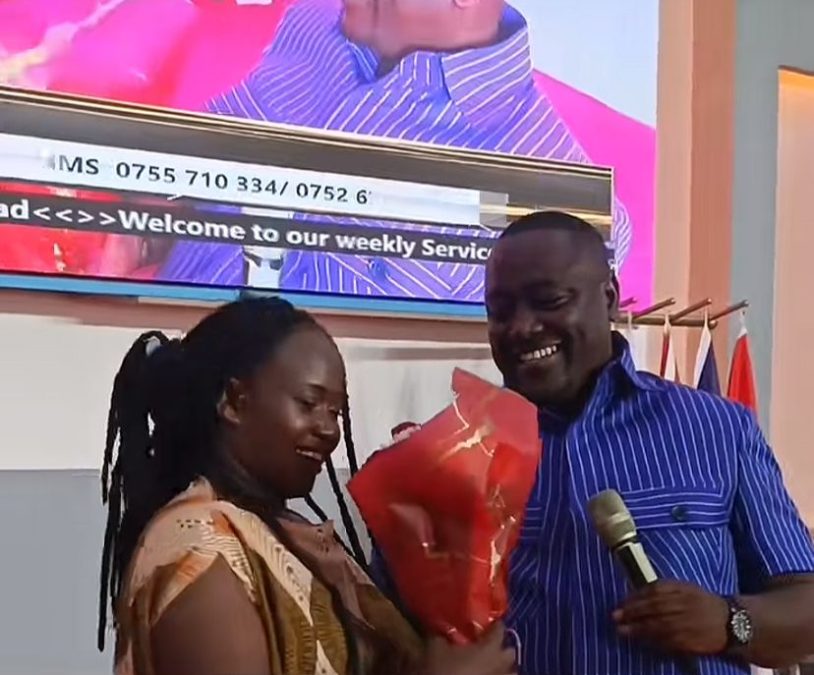 Pastor Kanyari hands a bouquet of roses to Marion Naipei. PHOTO/Screengrab by K24 Digital of TikTok video by @kanyari.