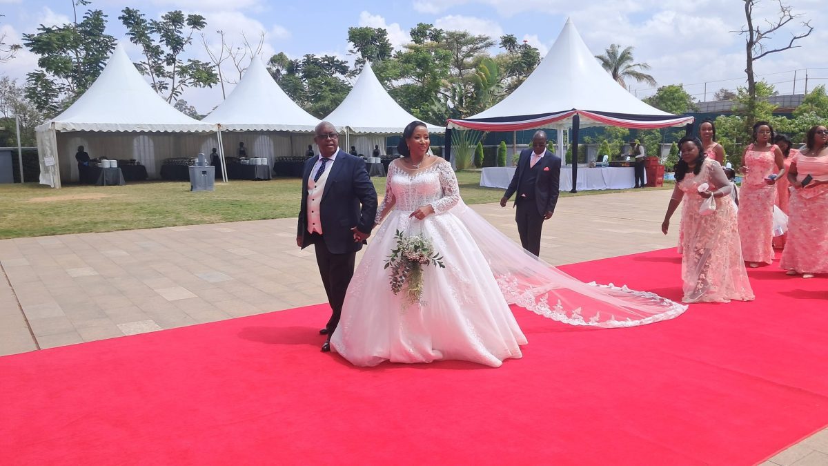 Lari Member of Parliament (MP) Mburu Kahangara walks down the aisle with his long-time partner Monicah Mugure Maina. PHOTOS/https://www.facebook.com/profile.php?id=100078360812913