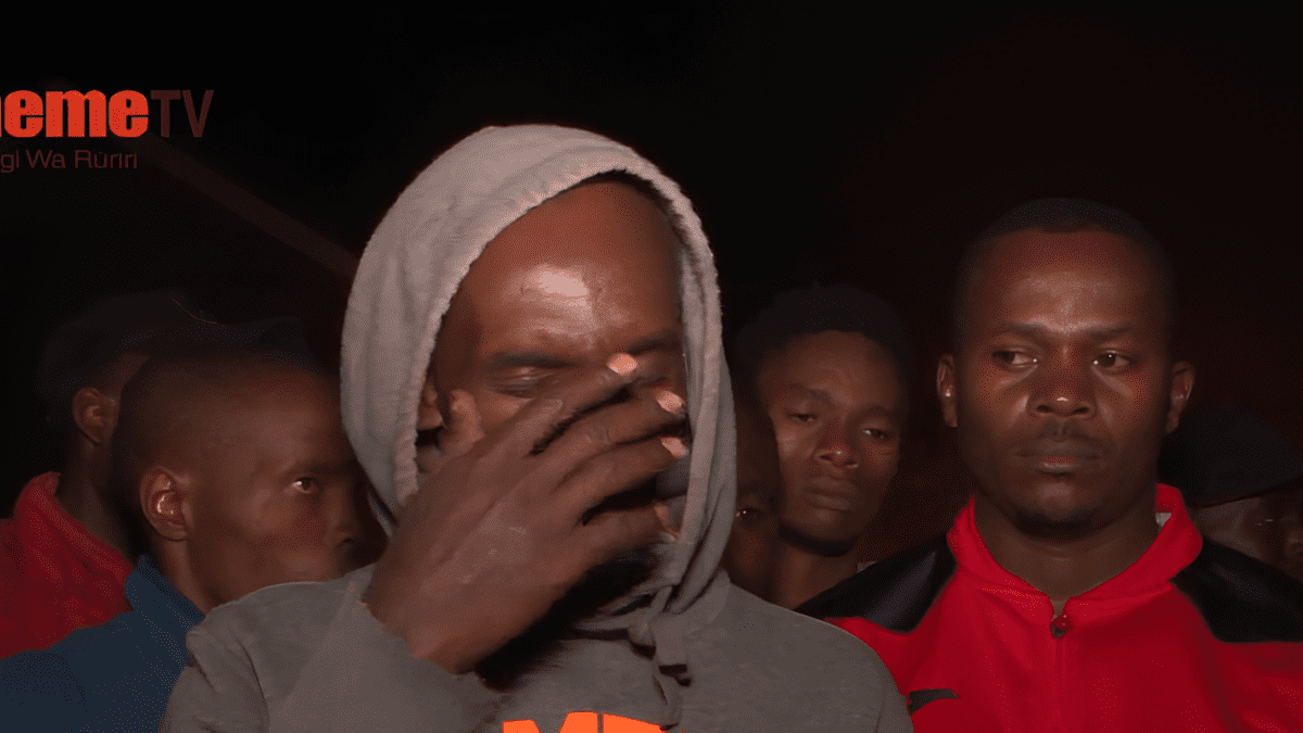 A Ruiru trader cries on camera after fire razes down businesses. PHOTO/Kameme TV