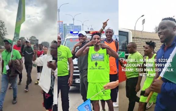 Eric Omondi flanked by a sizeable crowd as he embarks on a walk from Nairobi to Busia. PHOTO/A screengrab image by K24 Digital from https://www.facebook.com/profile.php?id=100044317755329