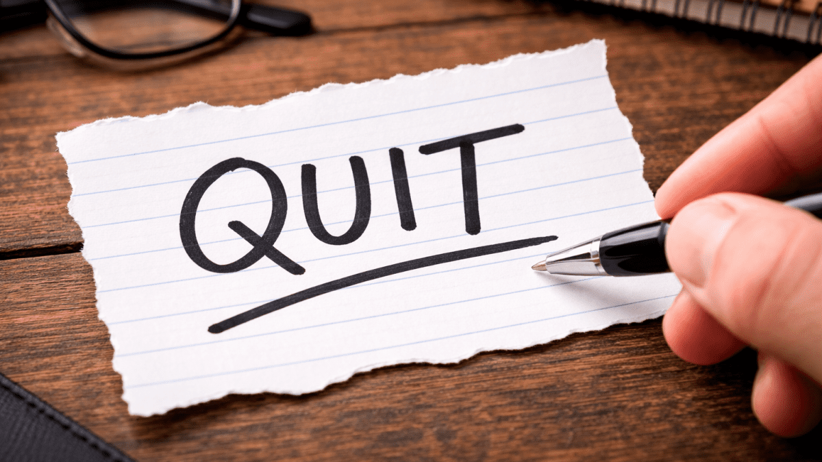 Some writes word QUIT on a piece of paper. PHOTO/ChatGPT/David Nthua