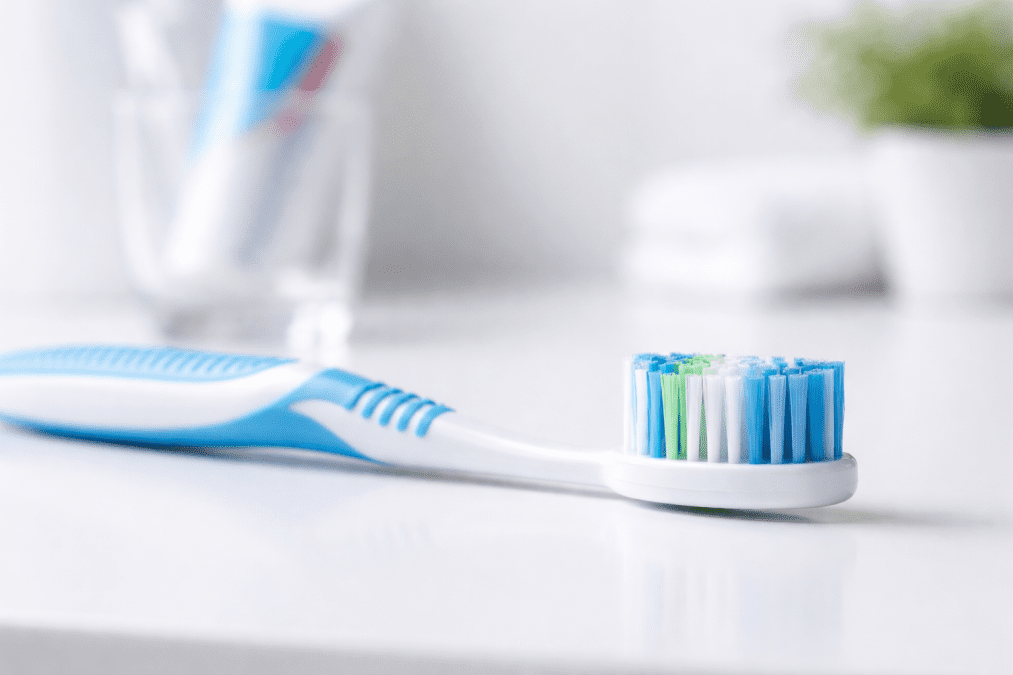 A white toothbrush placed somewhere. PHOTO/Photo generated by AI