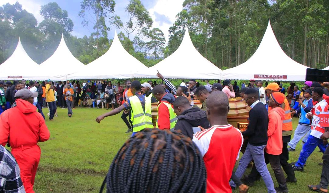 Mourners carry the body of late Gusii singer Van Quiz during a memorial service held at the Matagaro Primary School grounds on Thursday, March 26, 2026. /PHOTO/https://www.facebook.com/profile.php?id=61552539040659