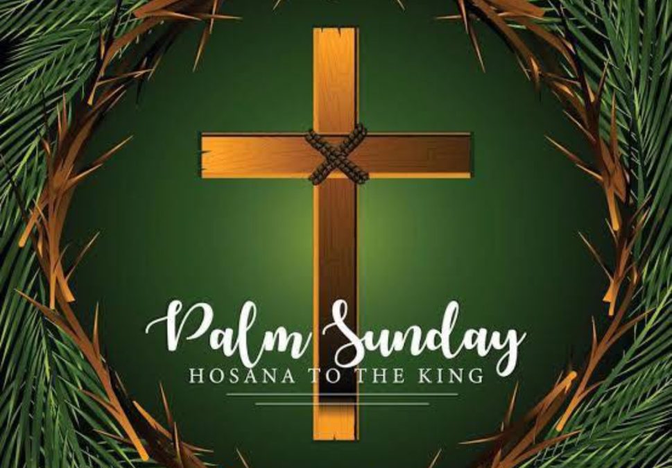 A cross is placed at the center of a well-crafted palm