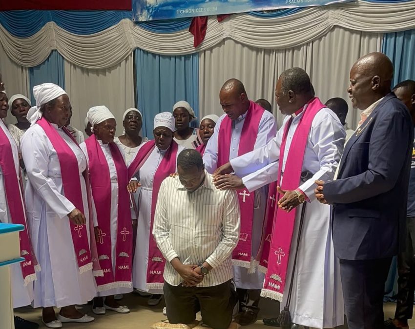 Willis Raburu being prayed for. PHOTO/@willisraburu/Instagram