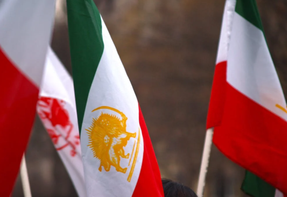 Previously silent Iran players sing and salute anthem