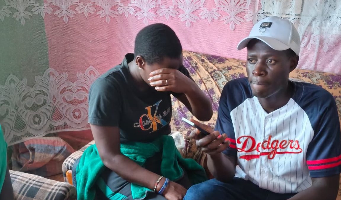 Van Quiz's wife Felisters Bosire sobs as Gusii Benga singer Vickytam Embande consoles her. PHOTO/https://www.facebook.com/vickytam.embande