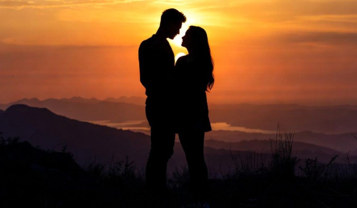 A couple by the sunset. PHOTO/AI