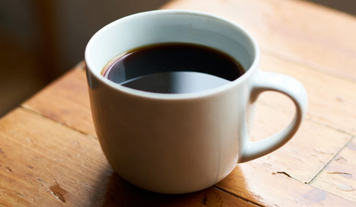 Cup of coffee placed on a table. PHOTO/Grok