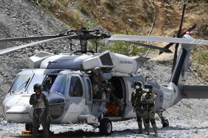 Trapped miner rescued from flooded tunnel after 14 days