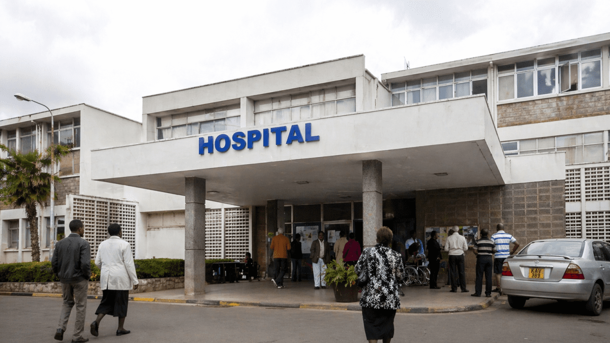 ealistic exterior image of a hospital entrance with patients and visitors arriving. PHOTO/Photo generated by AI