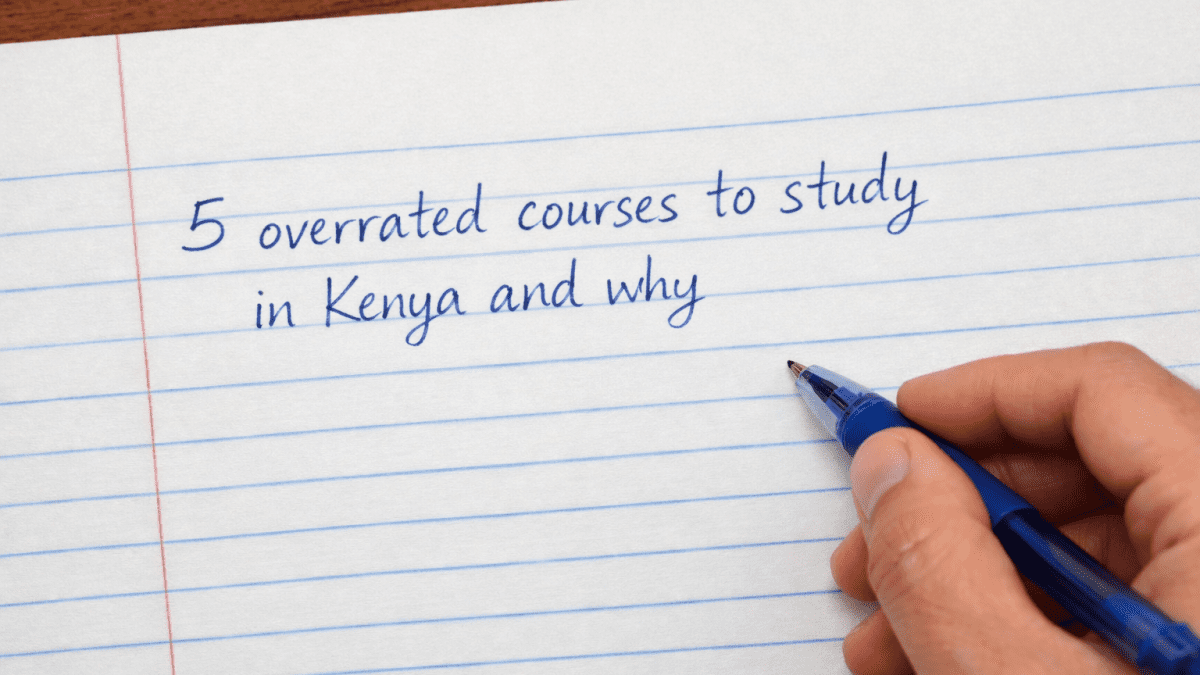 Handwritten note on paper reading 5 overrated courses to study in Kenya and why, written in blue pen on a desk. PHOTO/Photo generated by AI