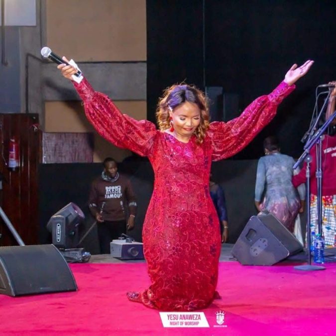 Lady Bee worshipping during a past event. PHOTO/https://www.facebook.com/ladybee254