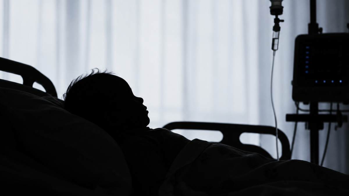 A baby lying in a hospital bed. PHOTO/Photo generated by AI