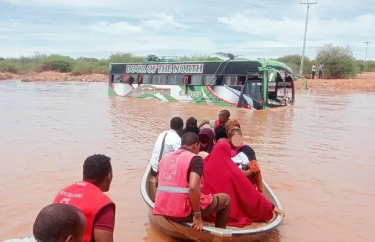 Kenya Red Cross personnel rescuing passengers after their bus was marooned by flood waters. Heavy rains caused flooding across Kenya in April 2024. PHOTO/X (@KenyaRedCross)