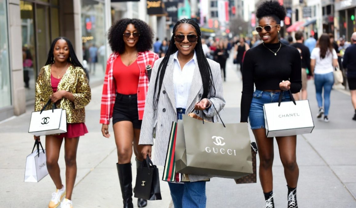 Group of girls after shopping. 