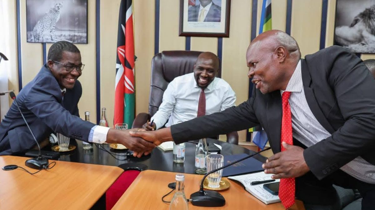 A handshake between Kennedy Kaunda and Energy CS Opiyo Wandanyi. PHOTO/https://www.facebook.com/HonOpiyoWandayi