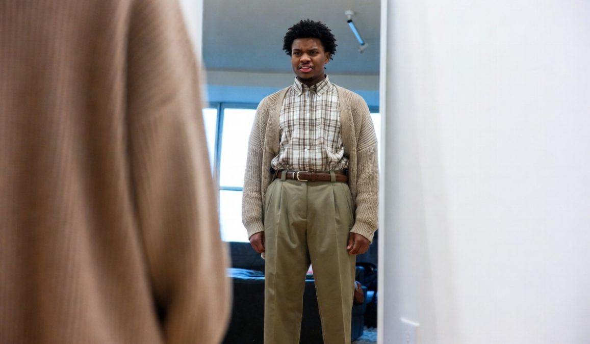 A young man dressed in an old man clothes. PHOTO/Grok