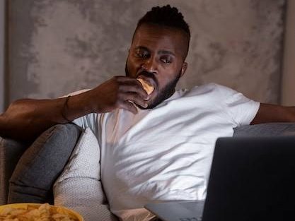 A man eating food late at night. PHOTO/Gemini