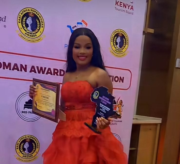 Rachael Otuoma posing with her award. PHOTO/@rachaelotuoma/TikTok.