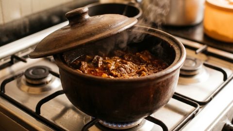 A steaming pot of rich beef stew simmering on a stove top. PHOTO/Gemini