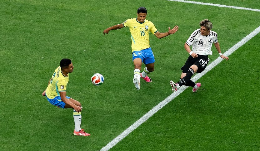 Brazil beat Japan in a stoppage-time thriller to advance to next round