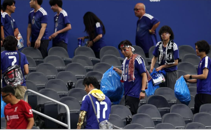 Japan fans captivate World Cup with stadium cleanup exercise