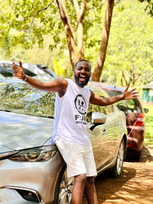 Tony Mwirigi posing next to his car. PHOTO/https://www.facebook.com/tonymwirigi001