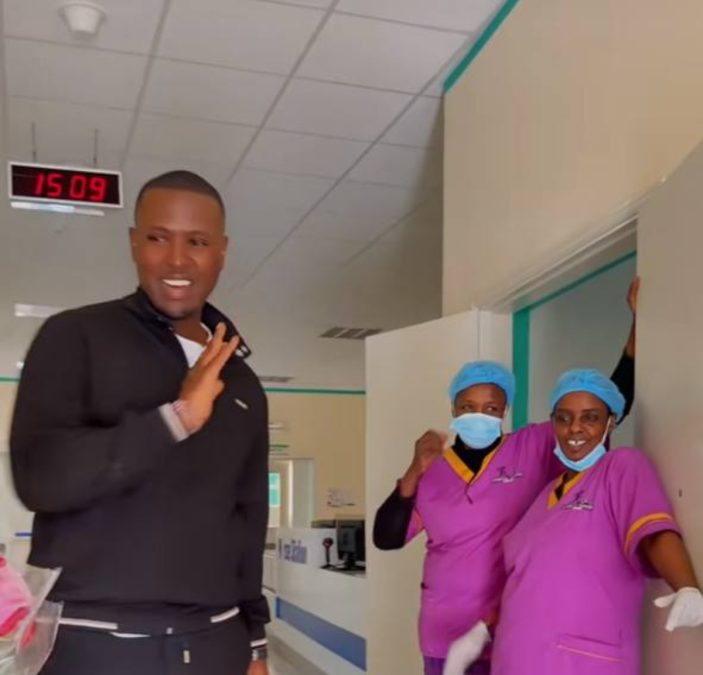 Obidan Dela waving back at nurses after picking Kwa Mbae boy's brother Lewis from the hospital. PHOTO/@obidandela/TikTok.