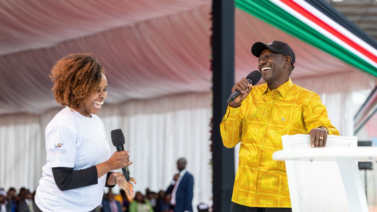 Woman warms crowd after requesting a hug from Ruto
