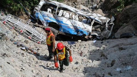 At least 32 dead after overcrowded bus plunges into ravine
