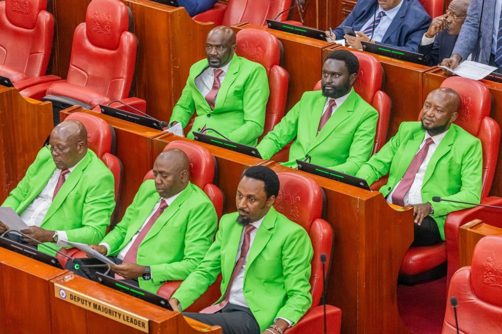 DCP-allied senators wearing matching green blazers