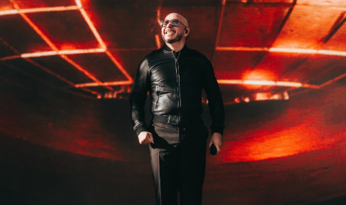 Rapper Pitbull breaks Guinness World Record for largest gathering of bald-cap fans