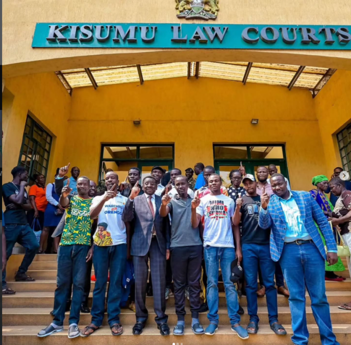 Willis Raburu and James Orengo at Kisumu Law courts