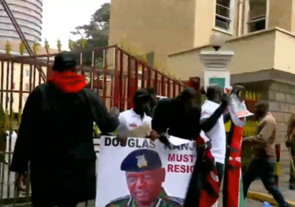 Activitts demonstrating outside Inspector General of Police Douglas Kanja's office. PHOTO/screengrab by K24 Digital from viseo shared online