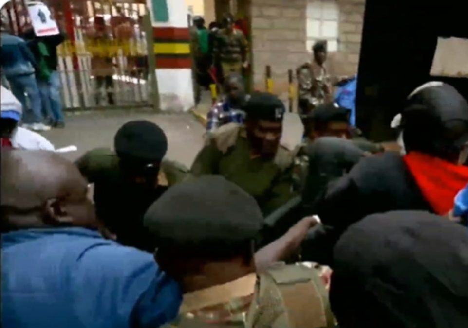 Activists demonstrating outside Inspector General of Police Douglas Kanja's office. PHOTO/screengrab by K24 Digital from video shared online