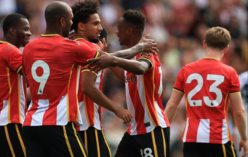 Brentford players celebrating one of their goals in a pre-season friendly recently. PHOTO/https://www.facebook.com/brentfordfootballclub1889/photos