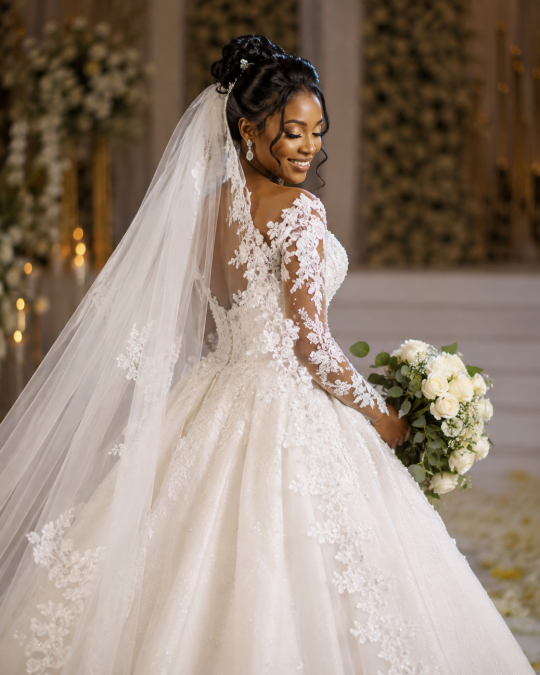 A bride in a beautiful wedding gown.