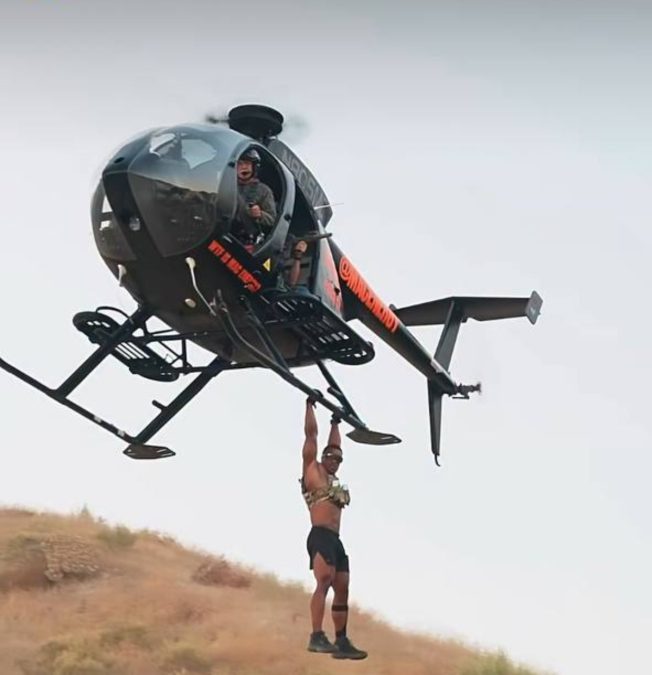 Ashton Hall dangling on a chopper. PHOTOS/Screengrabs by K24 Digital of Instagram video by @ashtonhall.