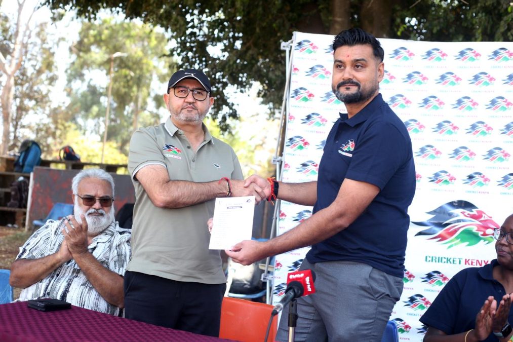 Cricket Kenya cjhairman Bhavesh Gohil (Left) receives  the national team squad for the 2026 ILT20 in Rwanda on Friday, August 28, 2026 at the Ruaraka Sports Club. PHOTO/Cricket Kenya