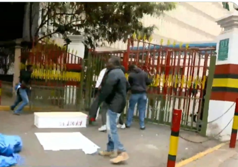 Activists demonstrating outside Inspector General of Police Douglas Kanja's office. PHOTO/screengrab by K24 Digital from video shared online