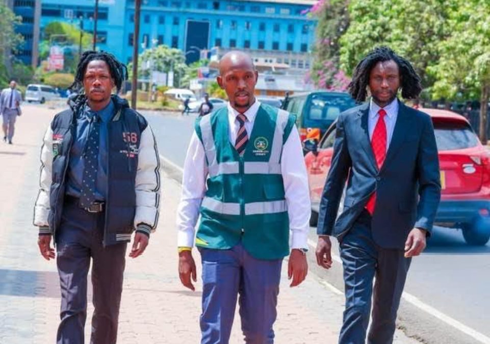 Geoffrey Mosiria with two men he rescued. PHOTO/https://www.facebook.com/kiongozi.mosiriake