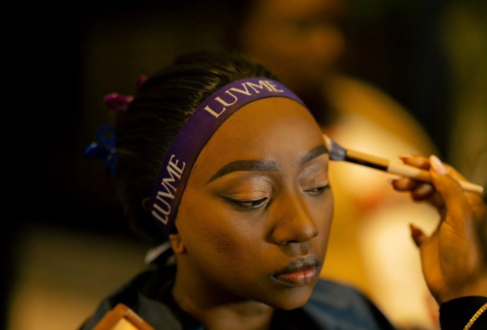 Charlene getting her make-up done. PHOTO/https://www.facebook.com/charlruto