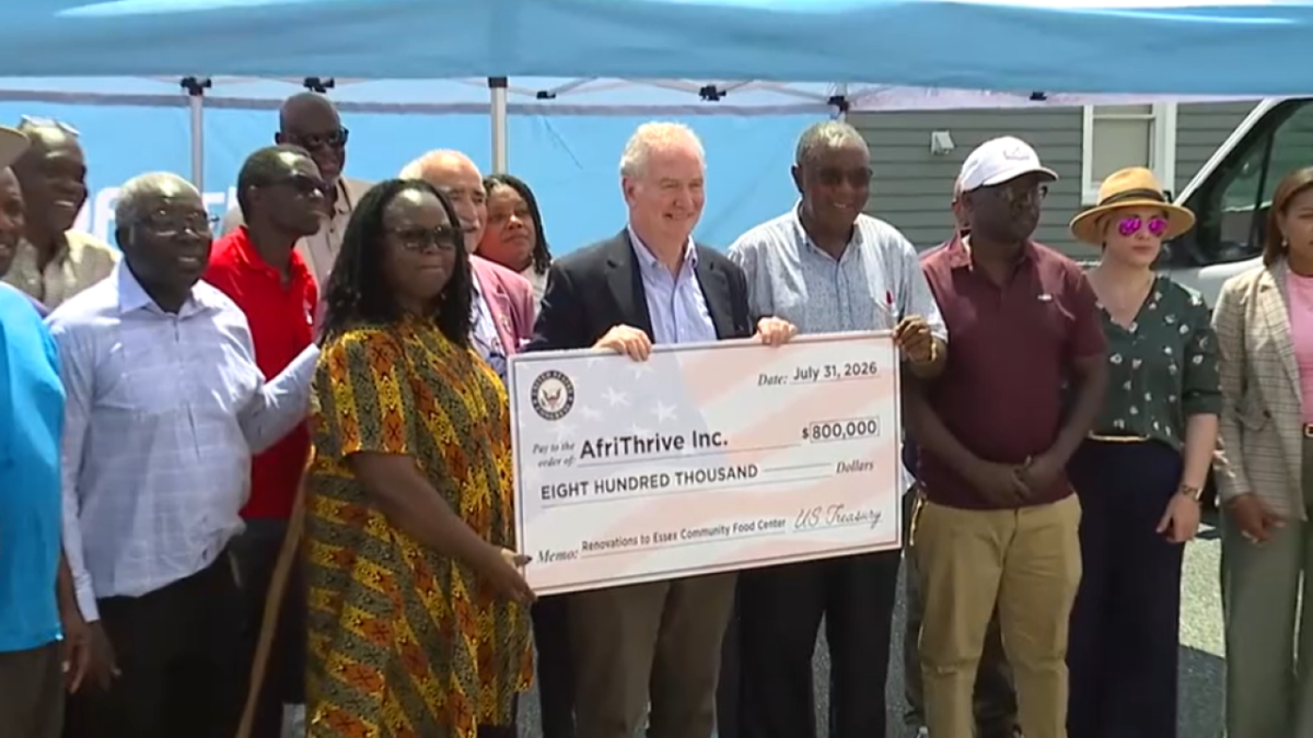 Choti and other AfriThrive officials receiving the funding cheque. PHOTO/https://www.facebook.com/AfriThriveInc