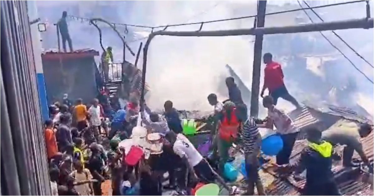 Residents attempting to put out an inferno in Gwatekera on Wednesday, August 26, 2026.