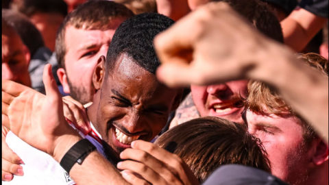Alexander Isak mobbed by fans after scoring against AFC Bournemouth PHOTO/@LFC/X